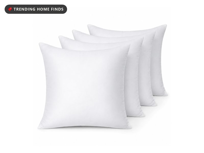Four white 18 by 18 inch throw pillow inserts