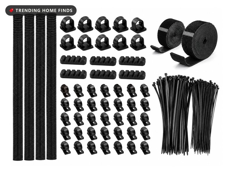 Cable management kit laid out flat with four black braided sleeves, rows of clips in several sizes, two rolls of hook and loop tape and a bundle of zip ties