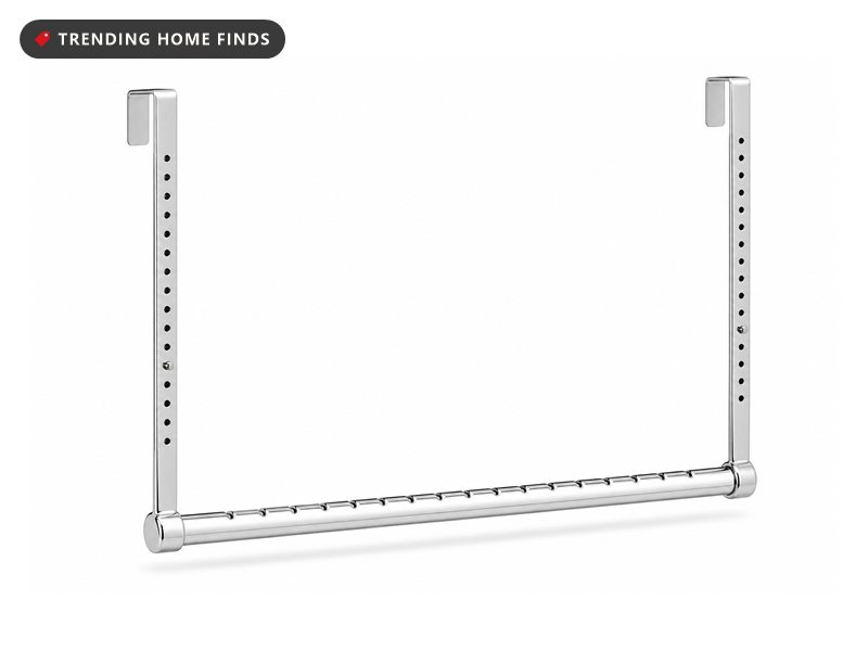 A polished chrome closet rod with two hooked uprights and a lower hanging bar notched for hangers.
