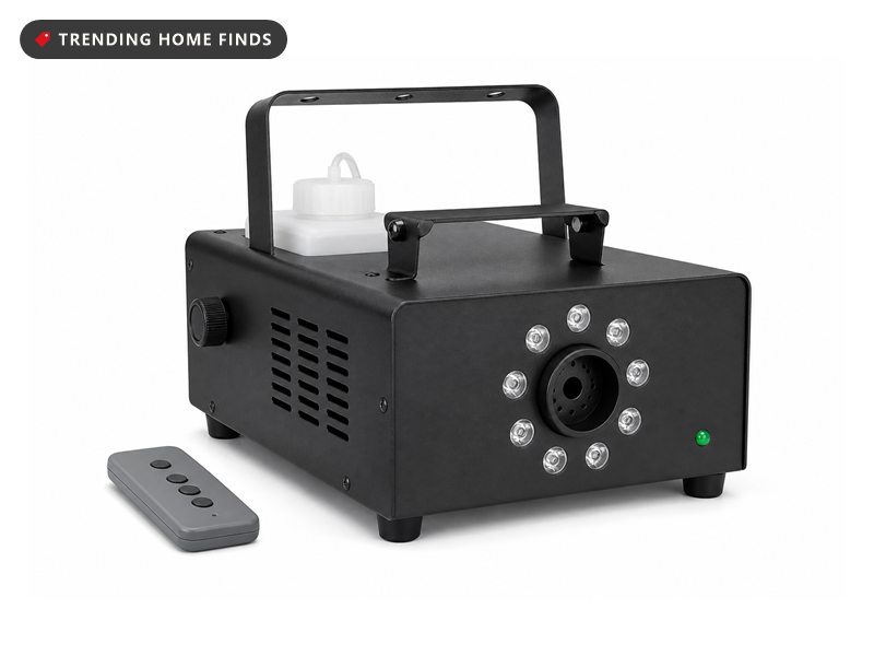 Black rectangular fog machine with a round front nozzle ringed by nine LED lenses, two carry handles and a translucent fluid tank.