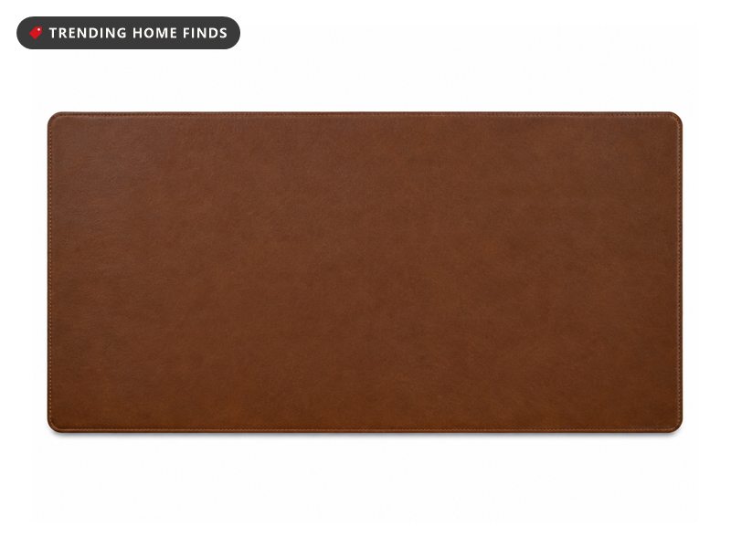 Brown PU leather desk pad lying flat with rounded corners