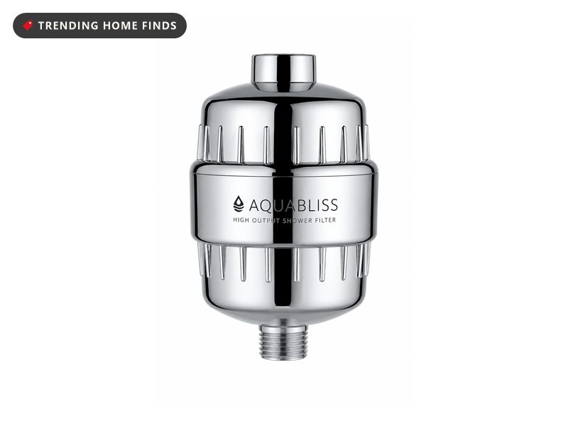 Chrome high output multi-stage shower filter housing with a ribbed body and a threaded outlet