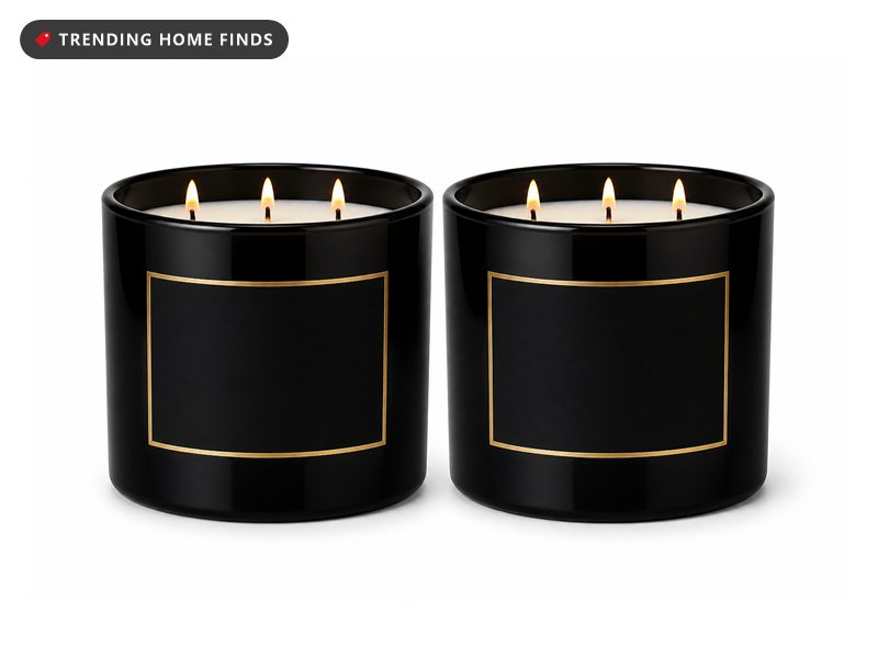 Two black jar candles with Mahogany Teakwood Intense labels