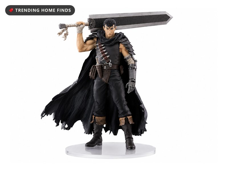 PVC figure of Guts from Berserk in his Black Swordsman gear, tattered black cape and armor, carrying the huge Dragon Slayer sword over one shoulder