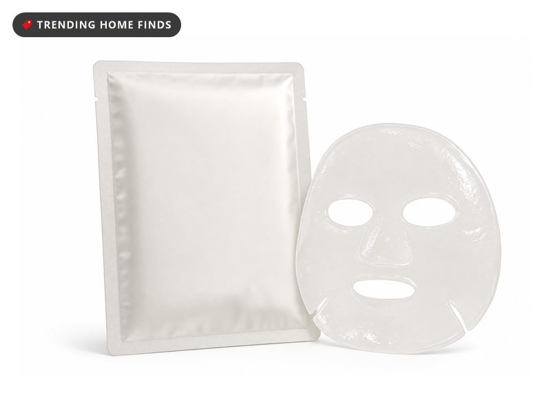 Clear hydrogel bio-collagen face mask beside its sealed pouch, on a white background