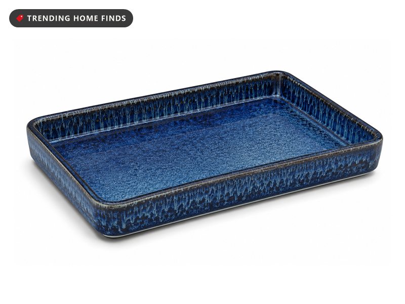 Rectangular ceramic vanity tray with a reactive deep blue glaze and a raised rim