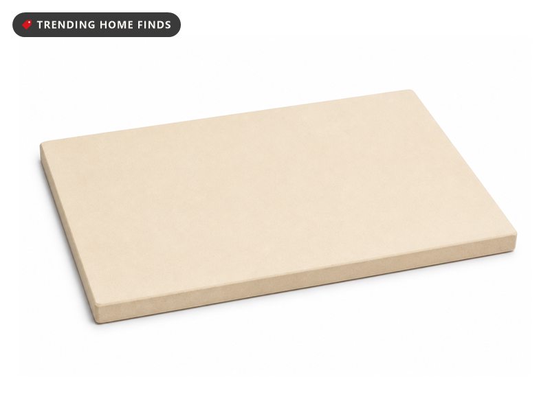 A plain rectangular beige cordierite pizza stone.