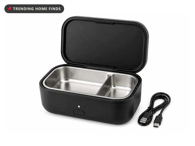 Cordless heated electric lunch box with a stainless steel tray, on a white background