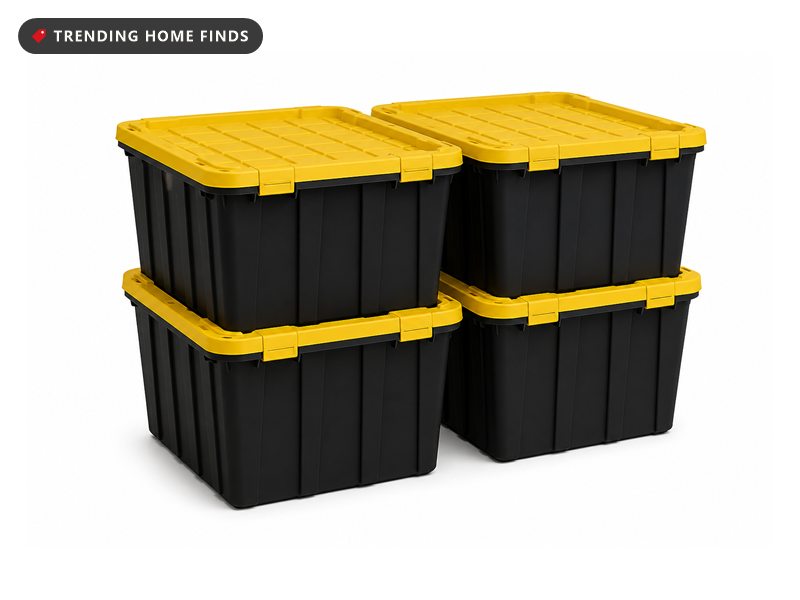 Four black plastic storage totes with bright yellow snap lids, stacked in two columns of two.