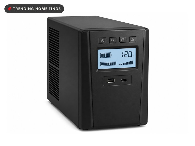 Black tower uninterruptible power supply with a blue LCD panel showing battery capacity and load.