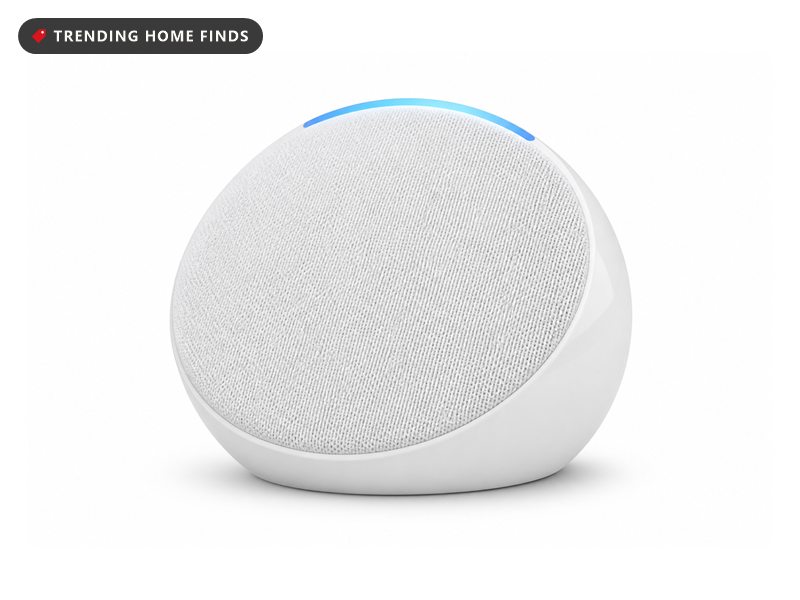 White half sphere smart speaker with a light bar along its top edge
