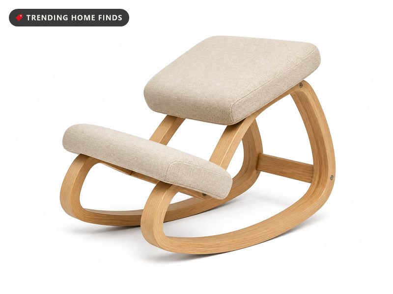 Ergonomic kneeling chair with a rocking wooden base and padded cushions, on a white background