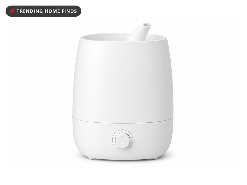 Large white cool mist humidifier with a top fill tank and mist nozzle, shown on a white background.