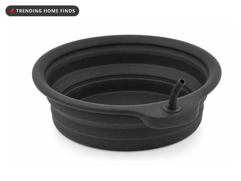 Black silicone face ice bath bowl with a lid and breathing tube, on a white background