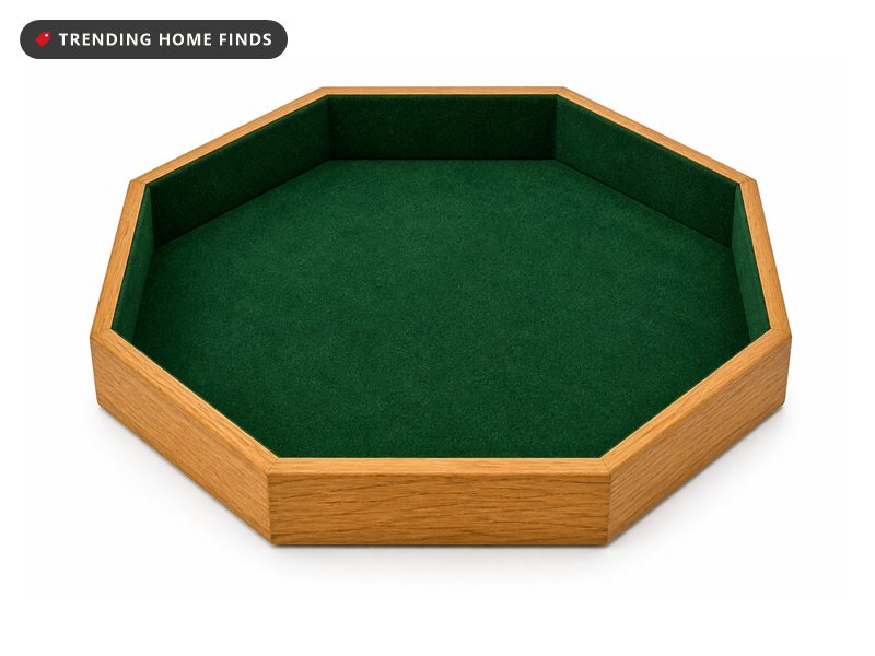 A twelve inch octagonal wooden dice tray lined with green felt, dice resting inside.