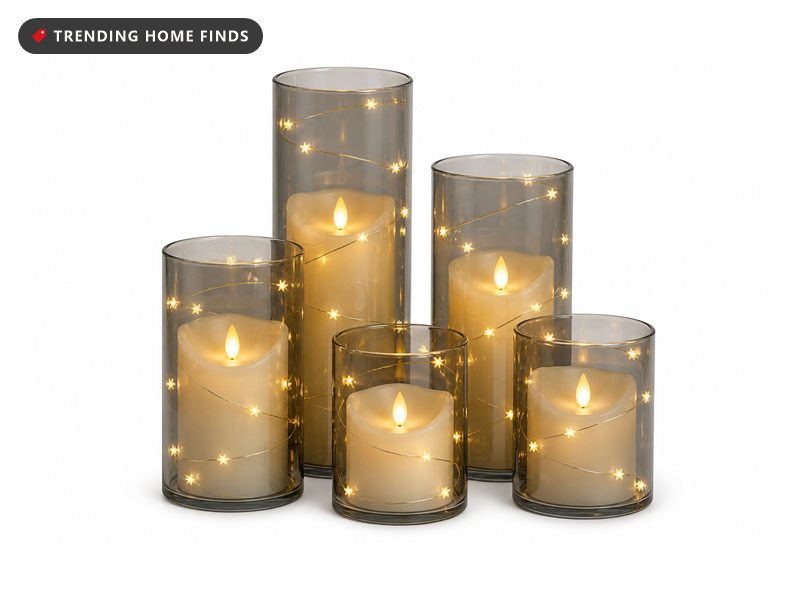 Five grey glass flameless pillar candles of different heights with flickering LED flames, fairy light strands inside, and a handheld remote