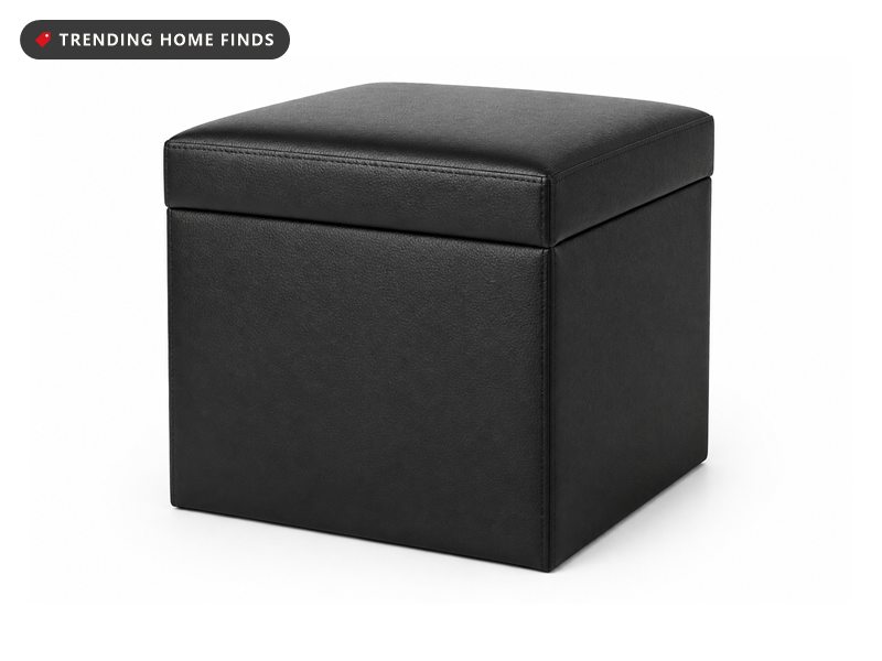 A black synthetic leather storage ottoman cube with fine edge stitching and a padded lift off lid.