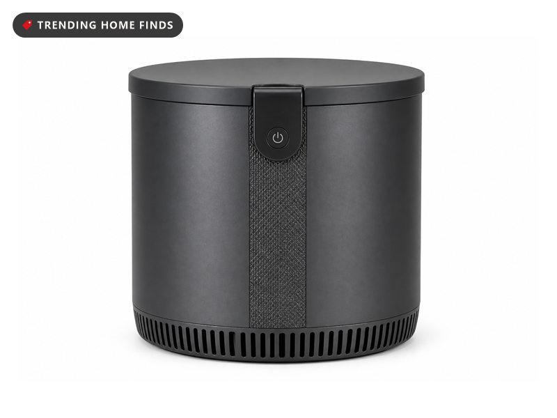 Matte black FoodCycler Eco countertop food recycler with a latched lid and a single power button on the front