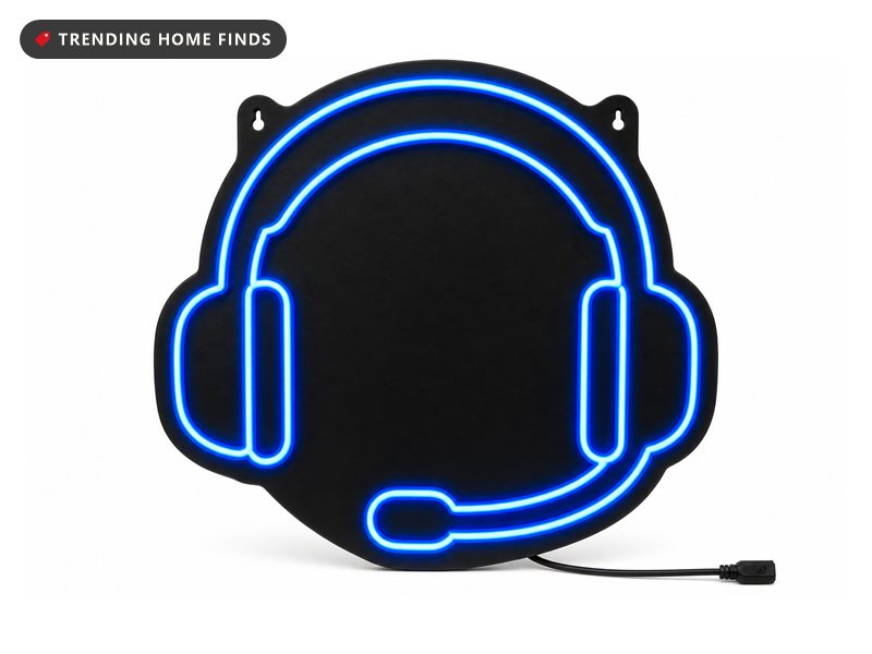 Neon sign of a gaming headset in blue outline with the words Can't Hear You I'm Gaming in white, pink and purple, with a USB cable trailing off frame