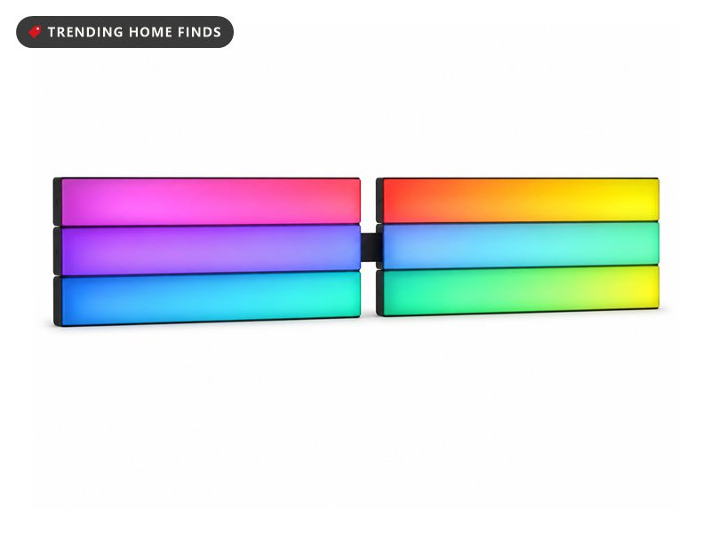 Six rectangular wall light bars arranged in two rows, glowing in pink, orange, green, yellow and blue gradients
