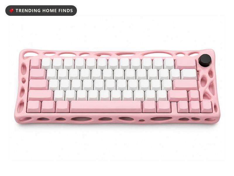 Pink mechanical keyboard in a skeletal cut-out frame, with white and pink keycaps, a full arrow cluster, a navigation column and a round control knob at the top right corner