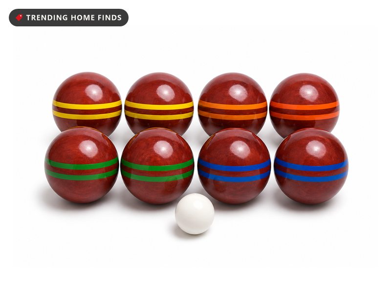 Eight striped hardwood bocce balls with a small white target ball.