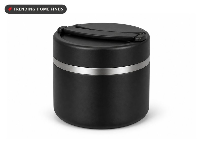 Squat matte black stainless steel food jar with a brushed silver band below the shoulder and a folding handle on the lid.