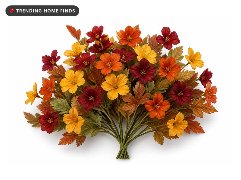 Bundle of artificial fall flowers in burgundy, golden yellow and burnt orange with dusty green fabric leaves.