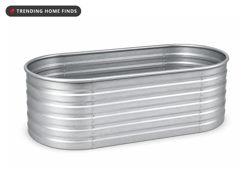 Silver oval galvanized metal raised garden bed with ribbed panels shown empty on a white background.