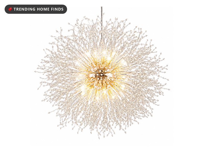 Crystal dandelion firework chandelier glowing with warm light