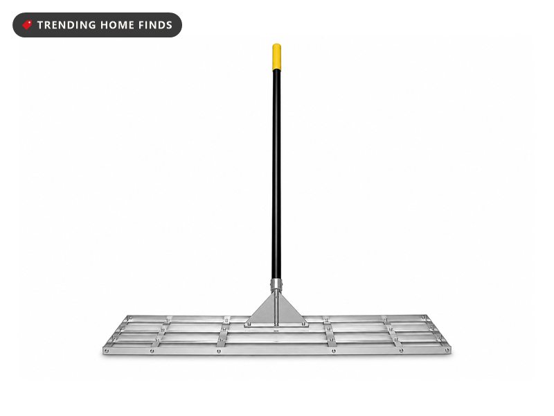 Rocklin Levelawn lawn leveling rake with a wide 30 inch stainless steel head and a long black handle with a yellow grip