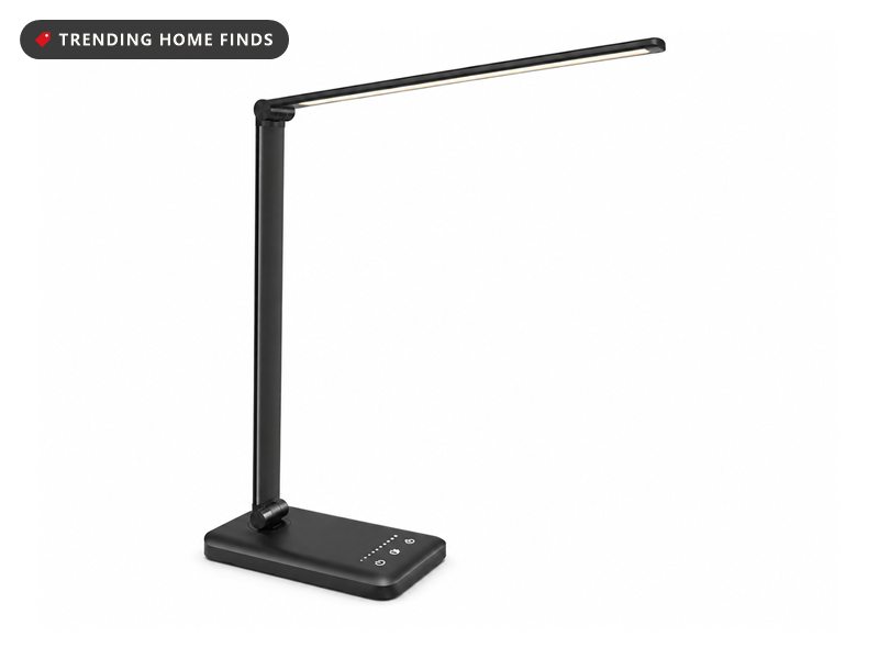 Black foldable LED desk lamp with touch controls on a flat rectangular base