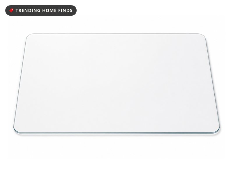 Clear rectangular tempered glass office chair mat with polished edges, shown on a white background.