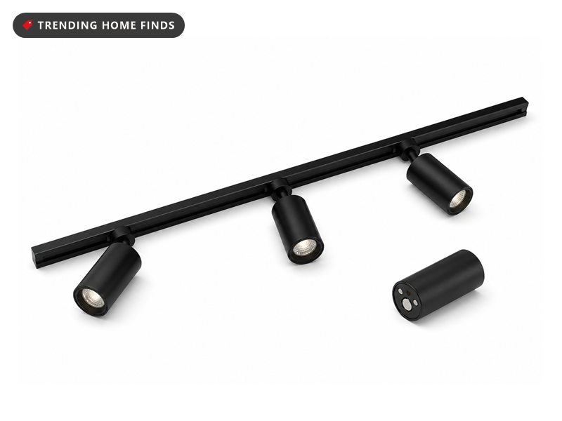 Magnetic modular track lighting rail with snap-on spot heads, on a white background