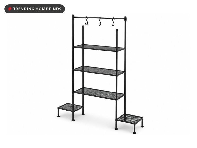 A tall black steel plant stand with three wide mesh tiers, two stepped lower tiers and a hanging rod across the top.