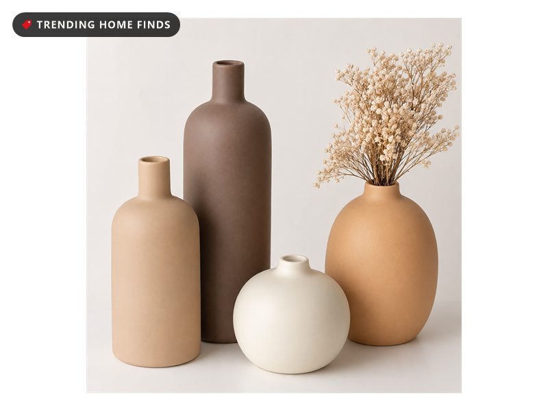 Four matte ceramic vases in cream, tan and brown with dried stems