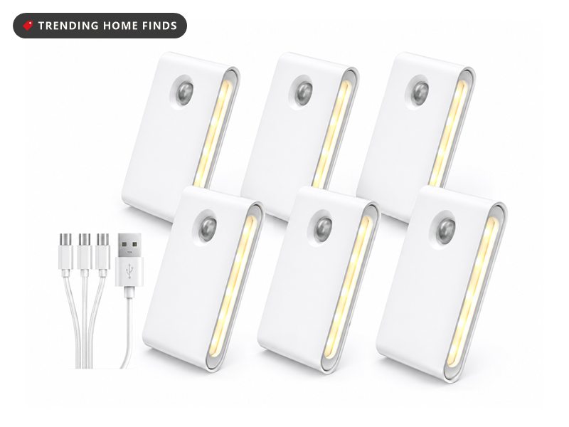 Six white motion sensor night lights with warm LED strips and a three-way USB charging cable