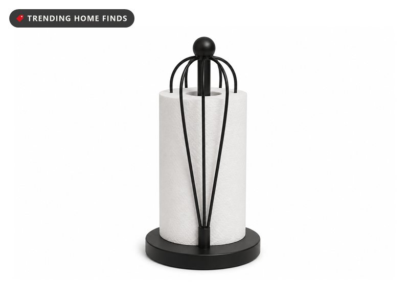 A matte black stainless paper towel stand with a round weighted base and six curved wire fingers around the post.