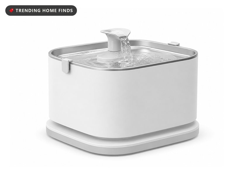 Low wide cat water fountain with a matte body, a shallow brushed stainless steel top tray and a central spout, on a dock base.