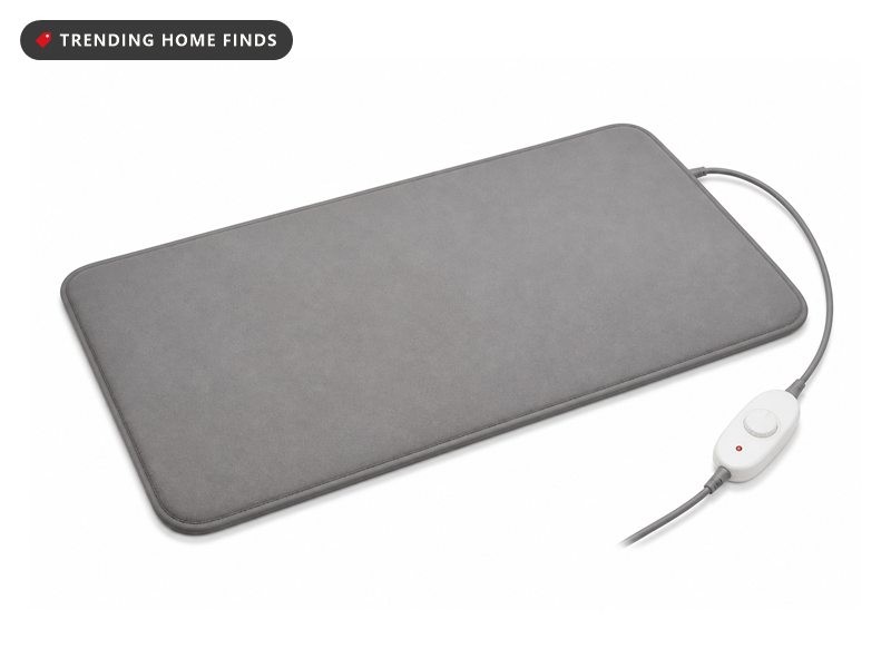Plug-in heated bathroom floor mat with a temperature controller, on a white background