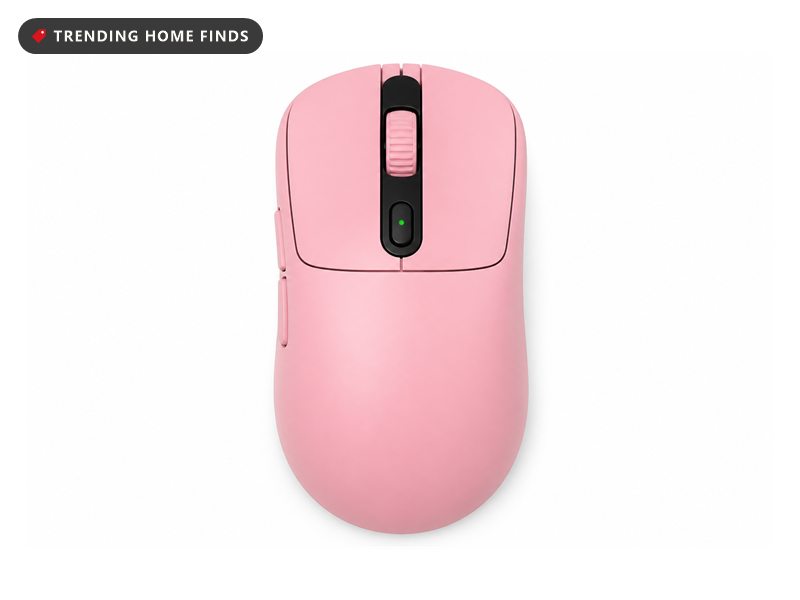 Pink wireless gaming mouse seen from above, with a textured scroll wheel, a button behind it lit by a small green indicator, two side buttons and the Razer logo on the palm rest