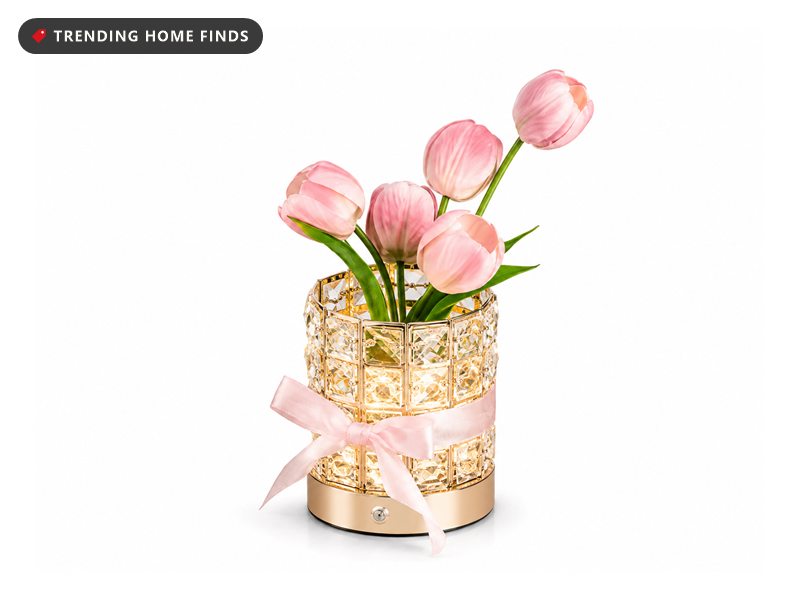Pink faux tulip bouquet in a glowing gold crystal cylinder lamp tied with a pink ribbon
