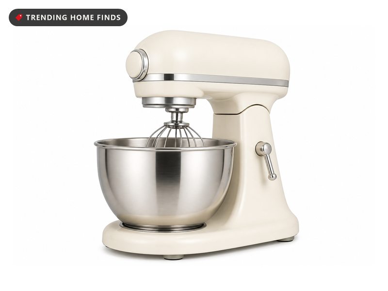 Cream retro tilt-head stand mixer with a stainless steel bowl, on a white background