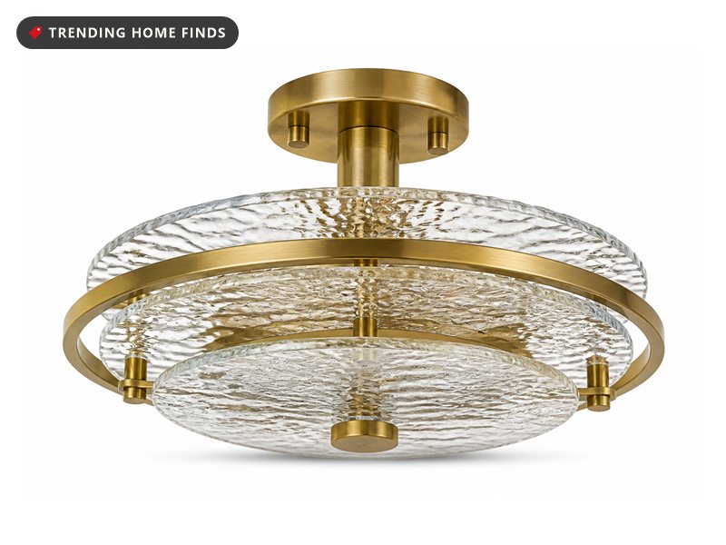 Ceiling light with a rippled glass shade and brass-tone frame, on a white background