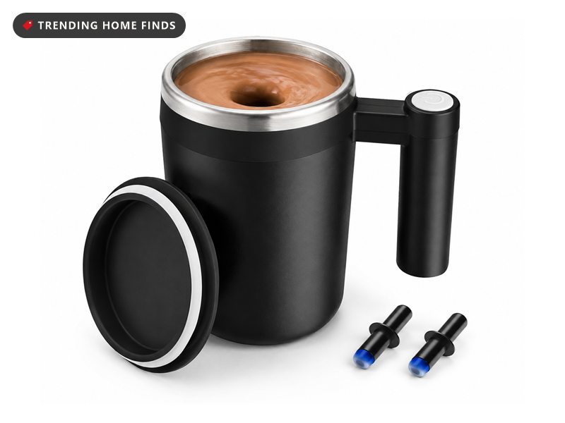 Black self stirring coffee mug with swirling coffee inside, a lid and two spare stir bars