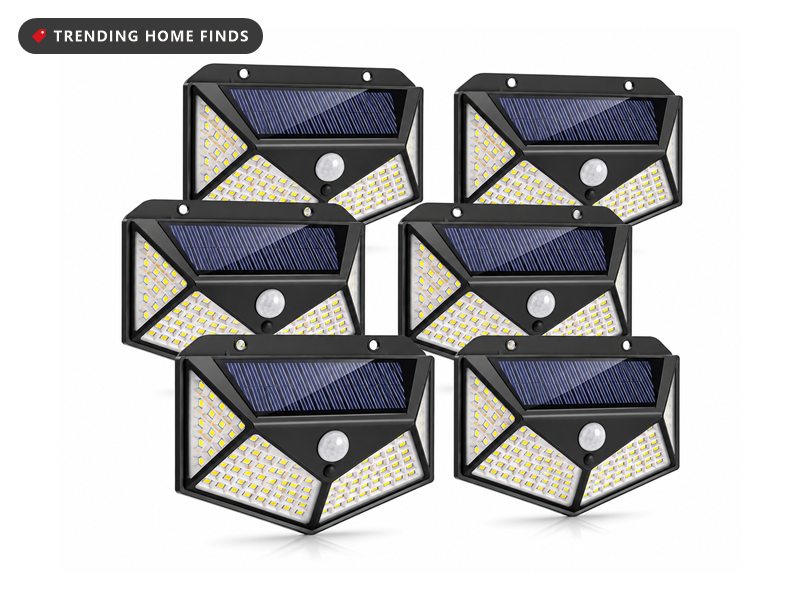Six black solar motion sensor security lights with wide LED arrays across the front and solar panels on top