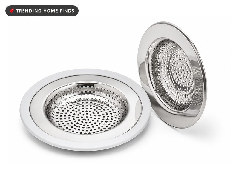 Two round stainless steel mesh drain strainers, one fitted with a soft white silicone rim.
