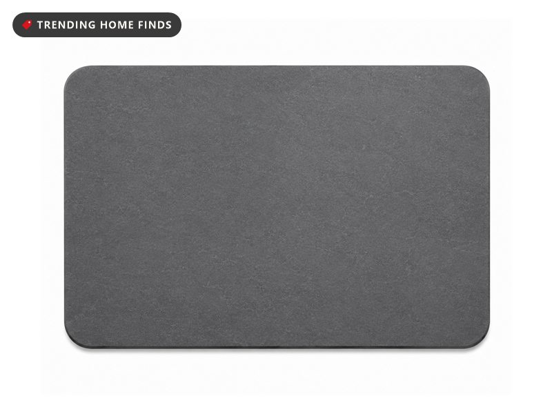 Rectangular dark grey natural stone dish drying mat with rounded corners, shown on its own