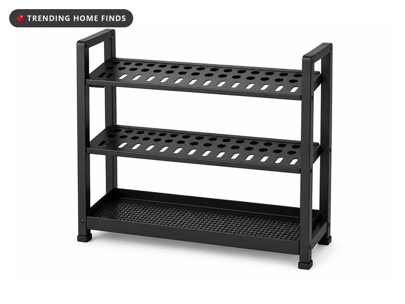 Upright black steel rack with stacked slot grids and a perforated bottom tray, sized for long handled tools.