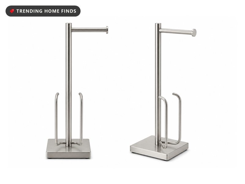 Slim brushed nickel toilet roll stand with a flat square base, a single post, a short dispensing arm and a lower reserve cradle.
